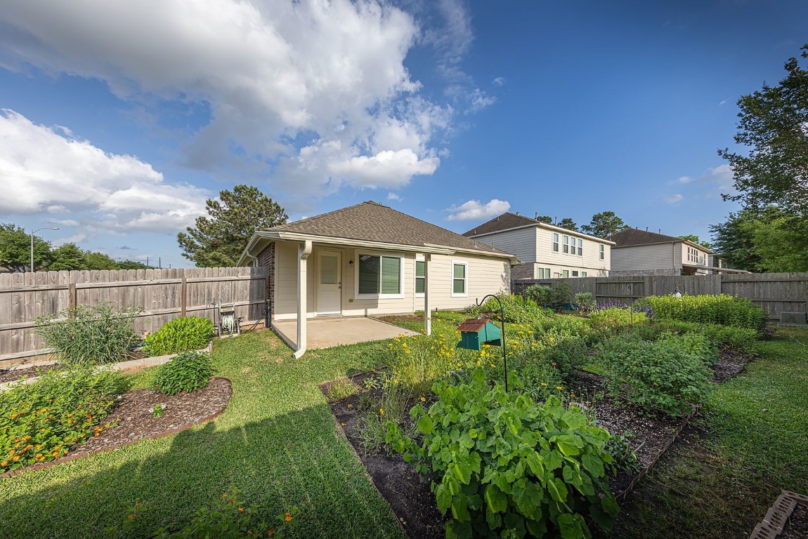 22715 Imperial Ivy Court Spring, TX 77373 - Photo 45 of 45 a front view of a house with garden