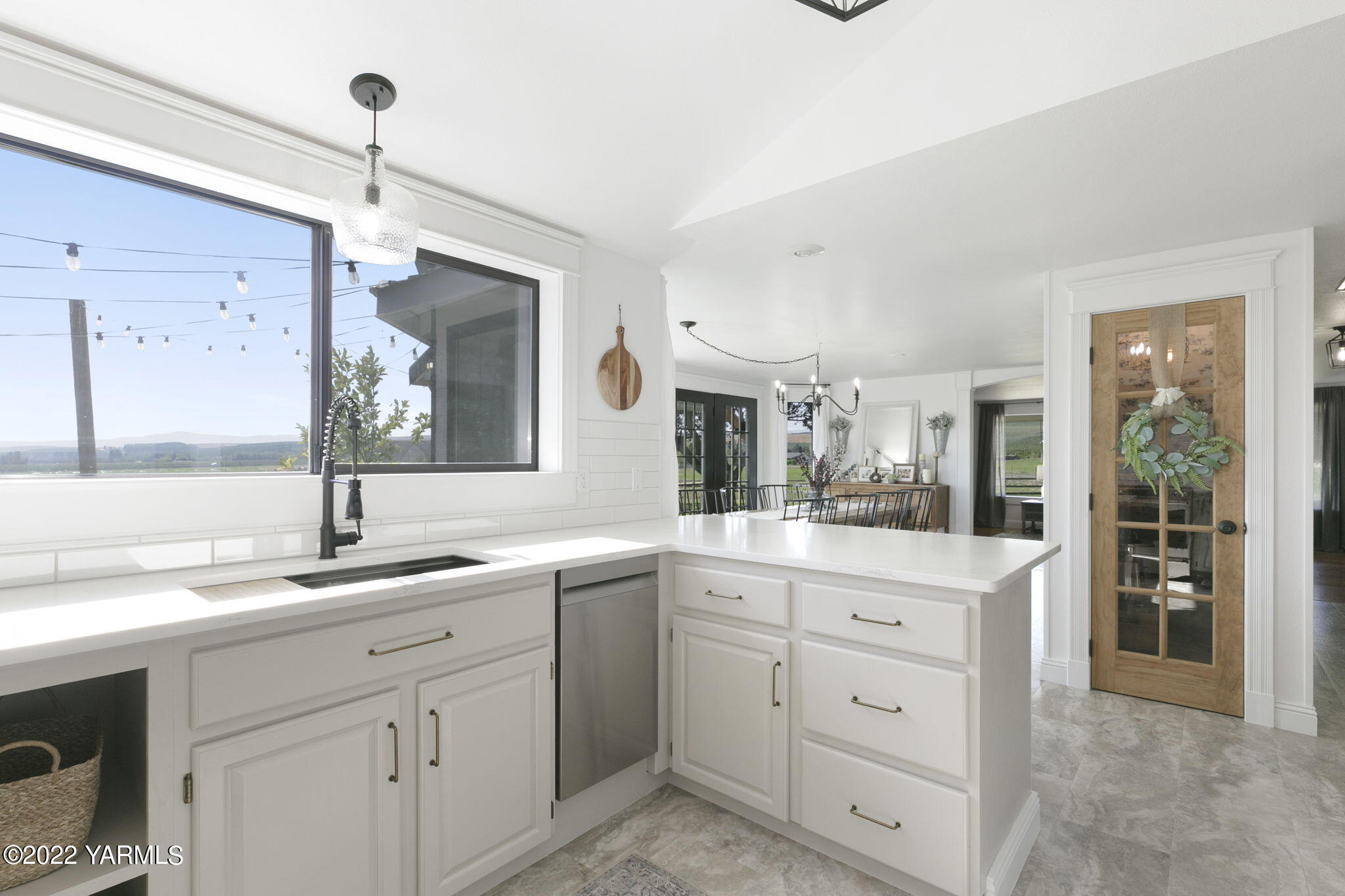 341 Section 1 Road Tieton, WA 98947 - Photo 12 of 44 a kitchen with cabinets stainless steel appliances a sink and a window