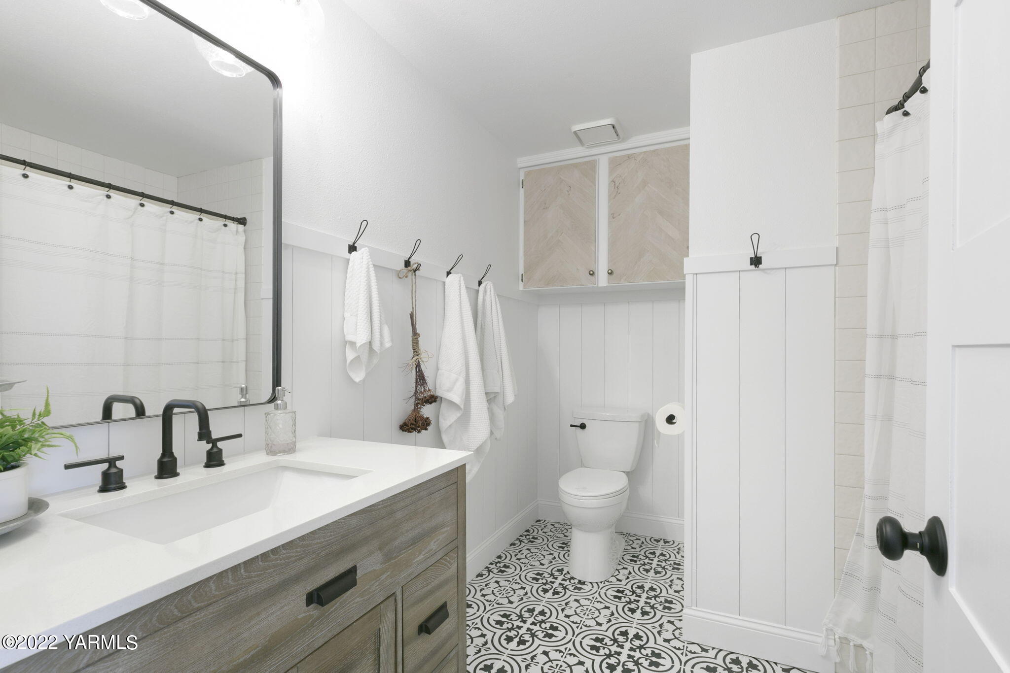341 Section 1 Road Tieton, WA 98947 - Photo 21 of 44 a bathroom with a sink toilet a mirror and shower