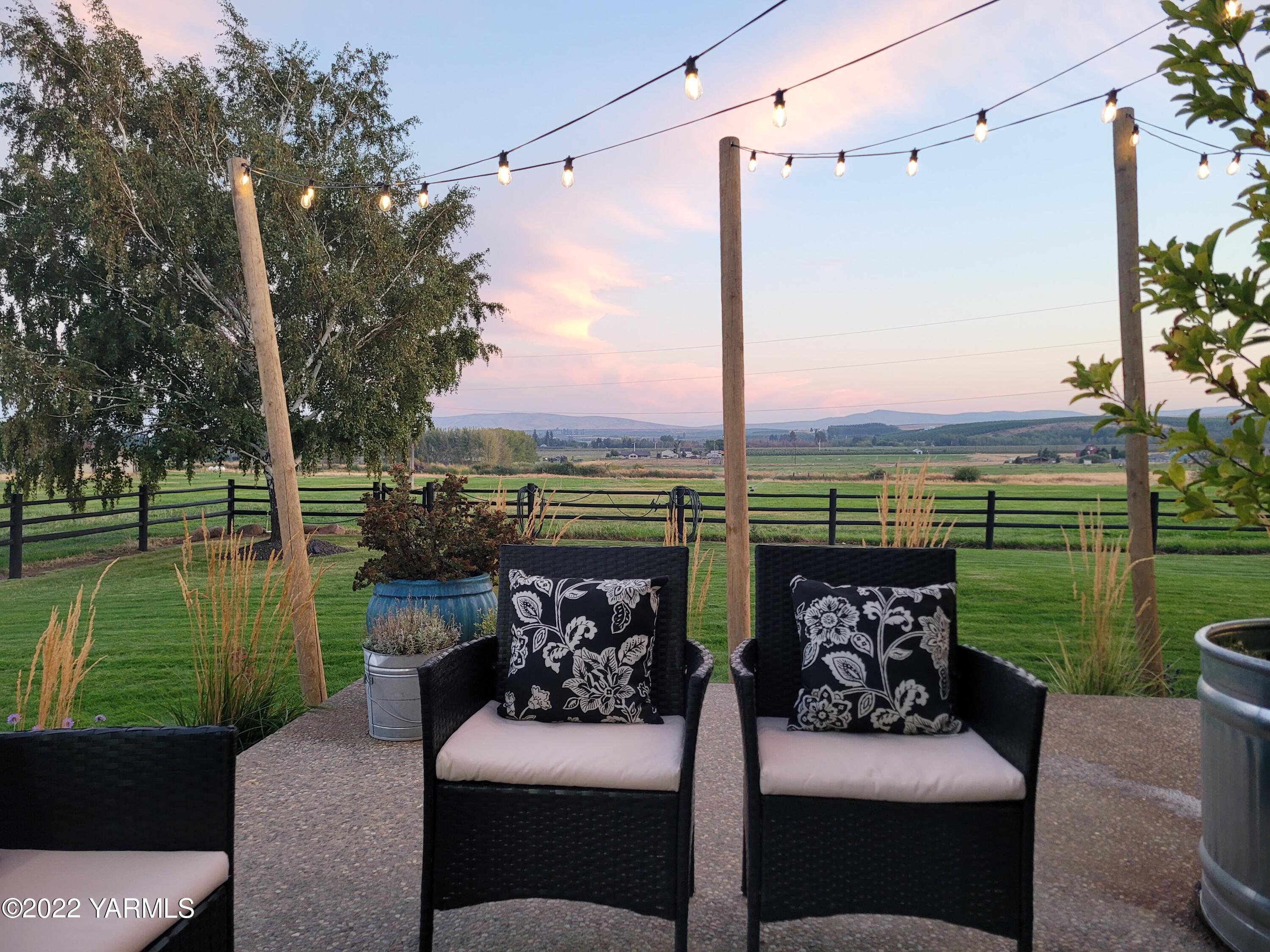 341 Section 1 Road Tieton, WA 98947 - Photo 43 of 44 a view of a patio with couches chairs and a table