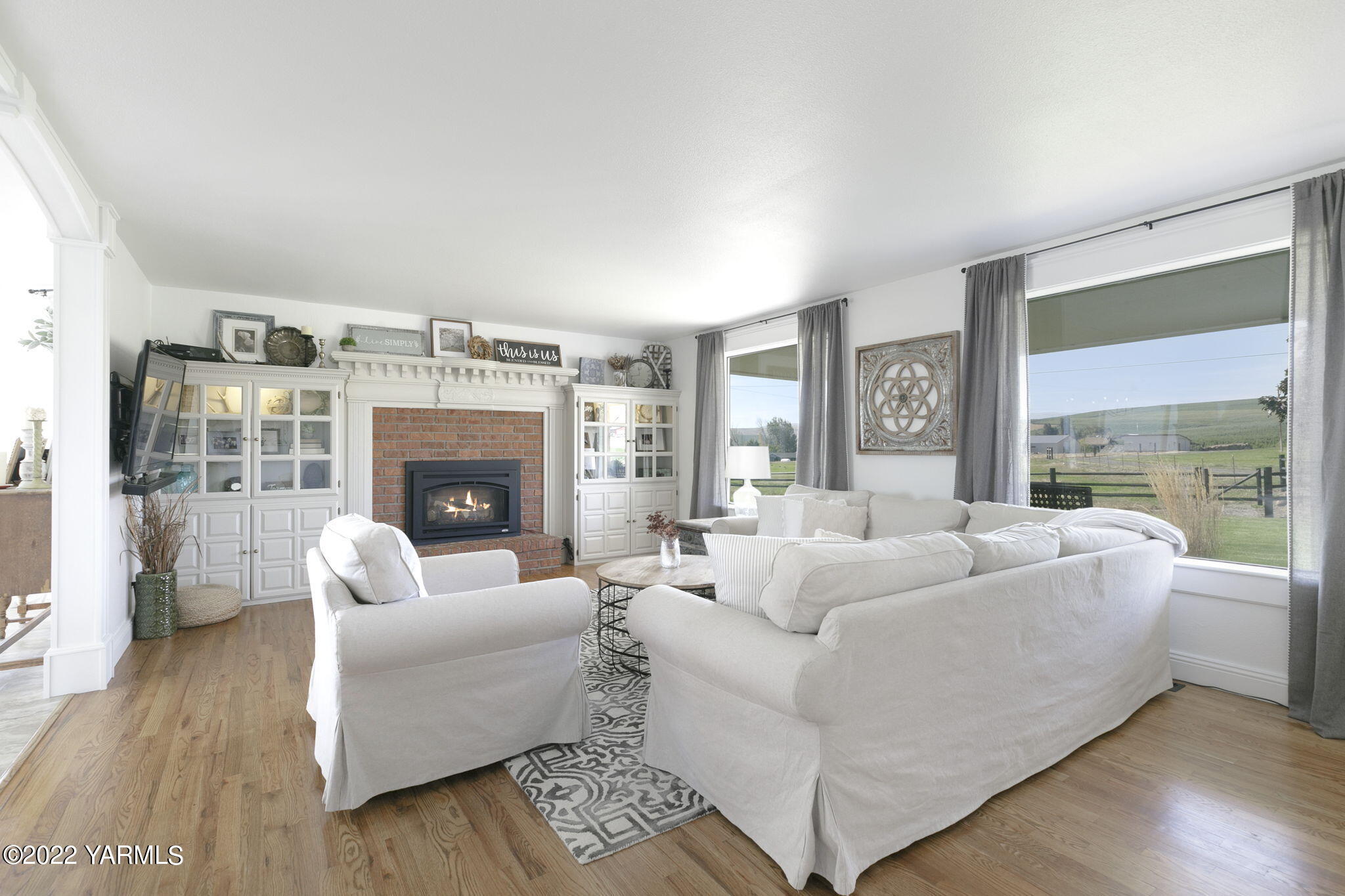 341 Section 1 Road Tieton, WA 98947 - Photo 6 of 44 a living room with furniture and a fireplace