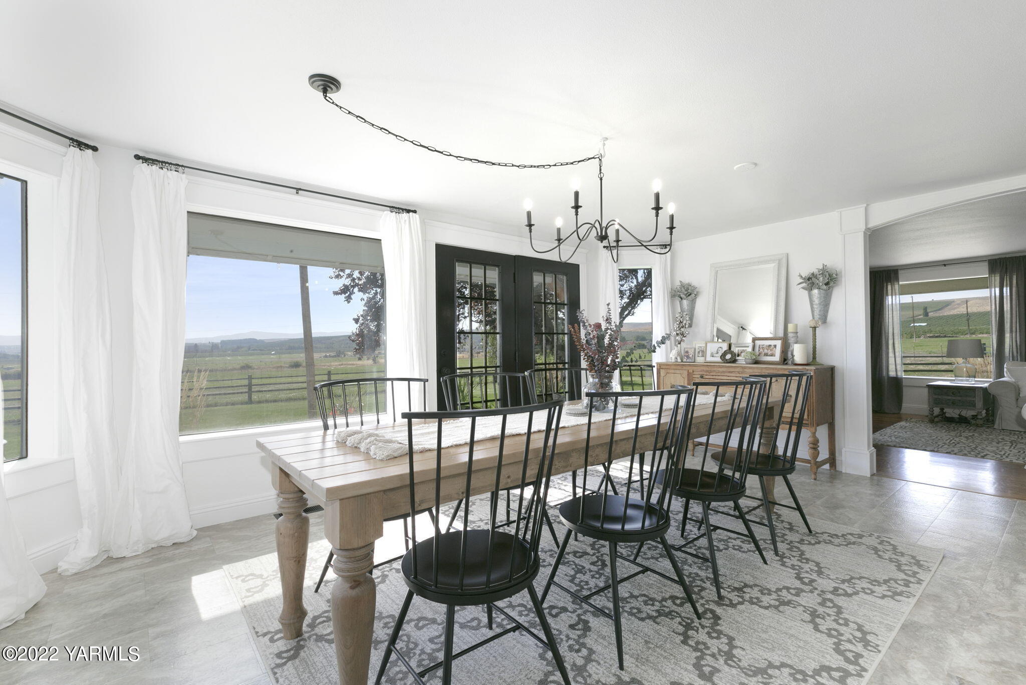 341 Section 1 Road Tieton, WA 98947 - Photo 8 of 44 a view of a dining room with furniture window and outside view