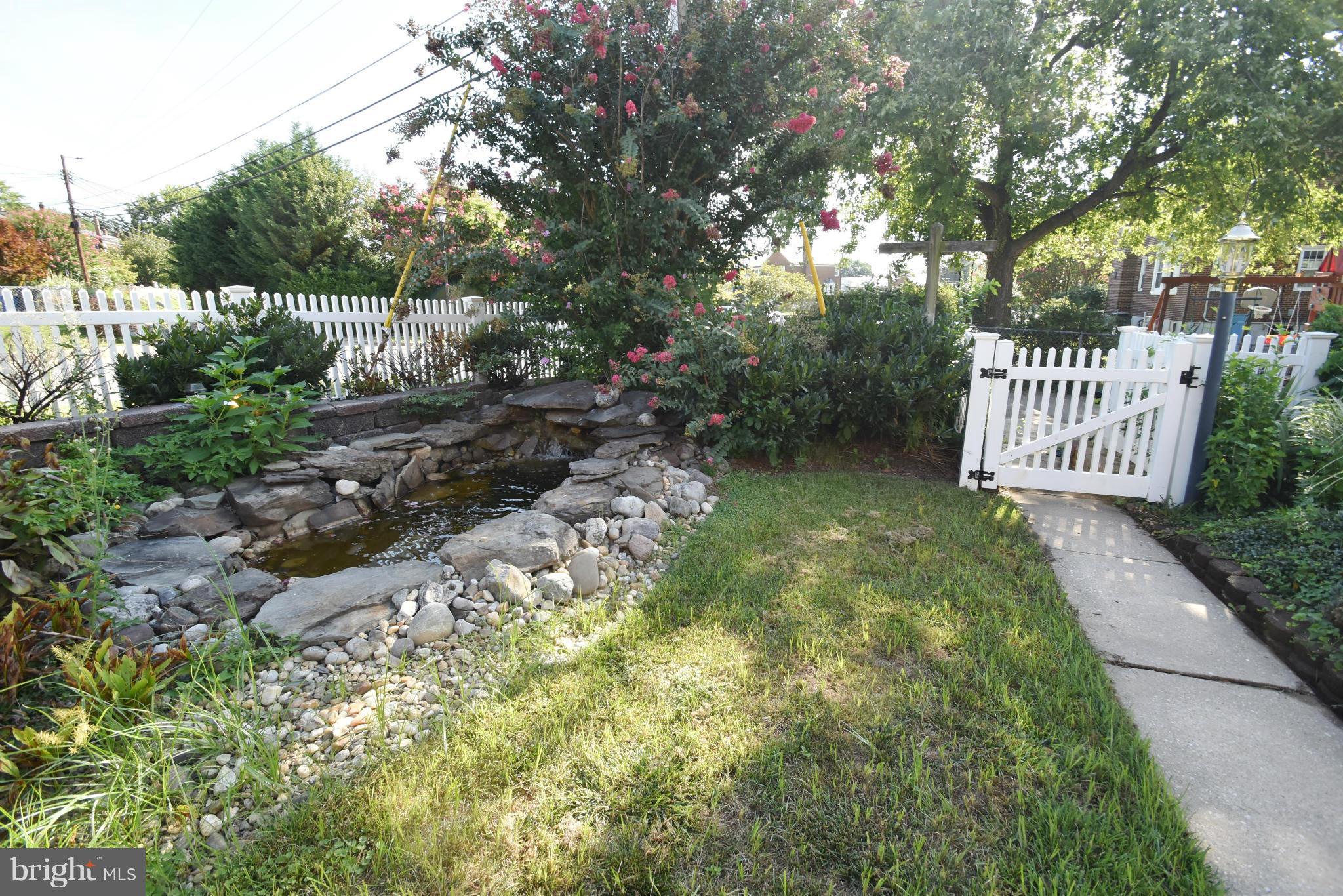 365 Whitfield Road Catonsville, MD 21228 - Photo 6 of 26 Stack stone pond with waterfall