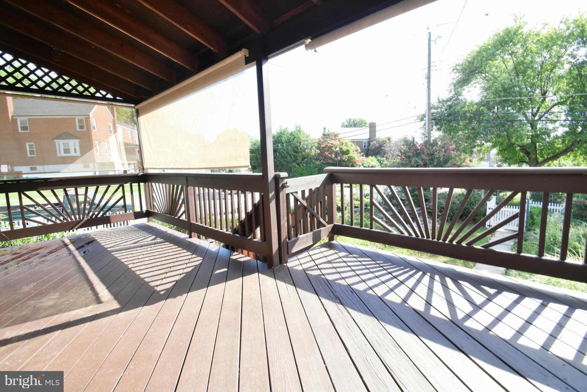 365 Whitfield Road Catonsville, MD 21228 - Photo 9 of 26 Large covered deck with shading blinds