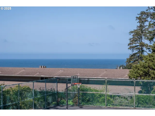 a view of swimming pool with a yard