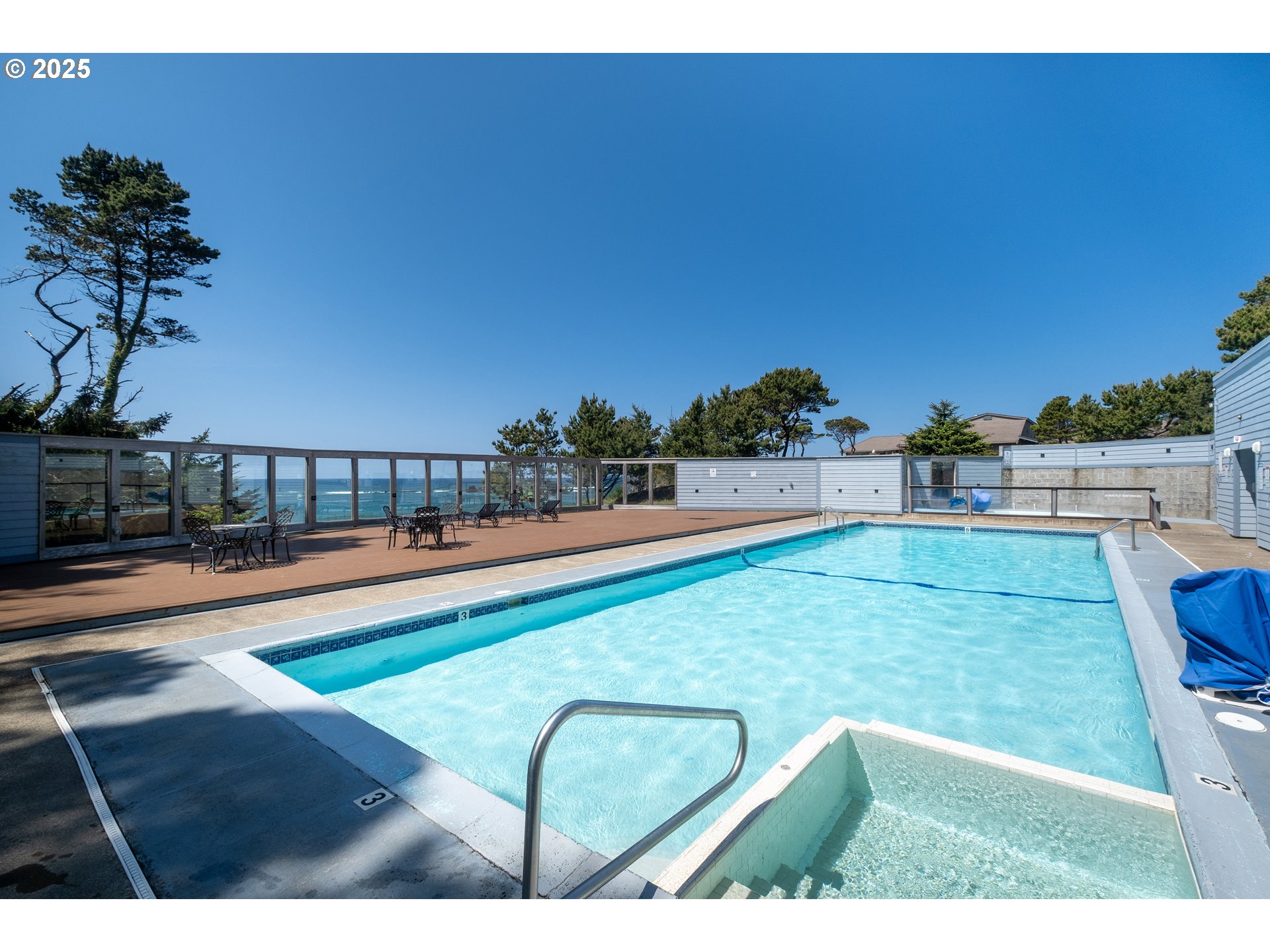 301 Otter Crest Loop, Unit 174/175 Otter Rock, OR 97369 - Photo 34 of 46 a view of swimming pool outdoor seating and living room