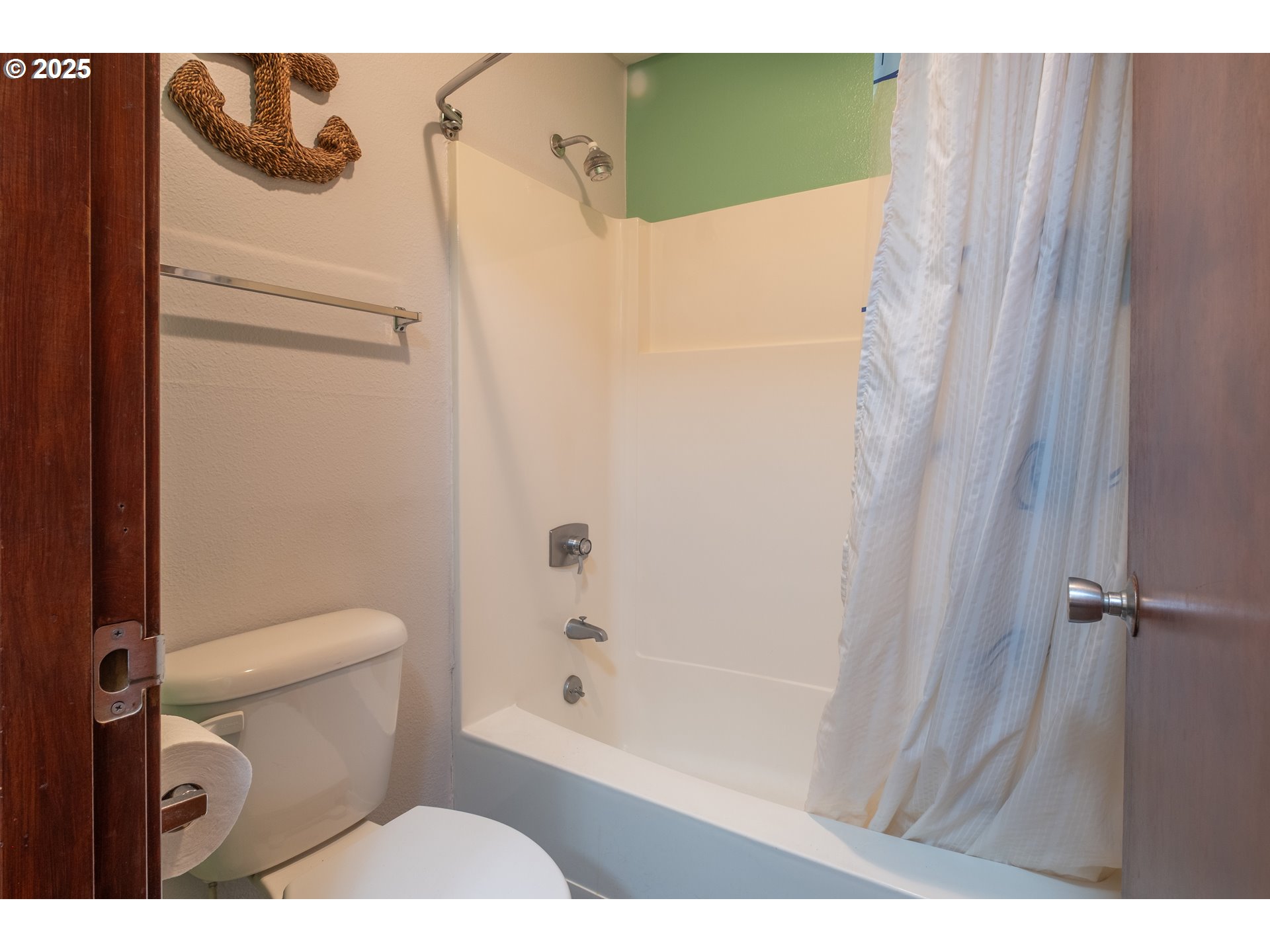 301 Otter Crest Loop, Unit 174/175 Otter Rock, OR 97369 - Photo 7 of 46 a bathroom with a shower and toilet