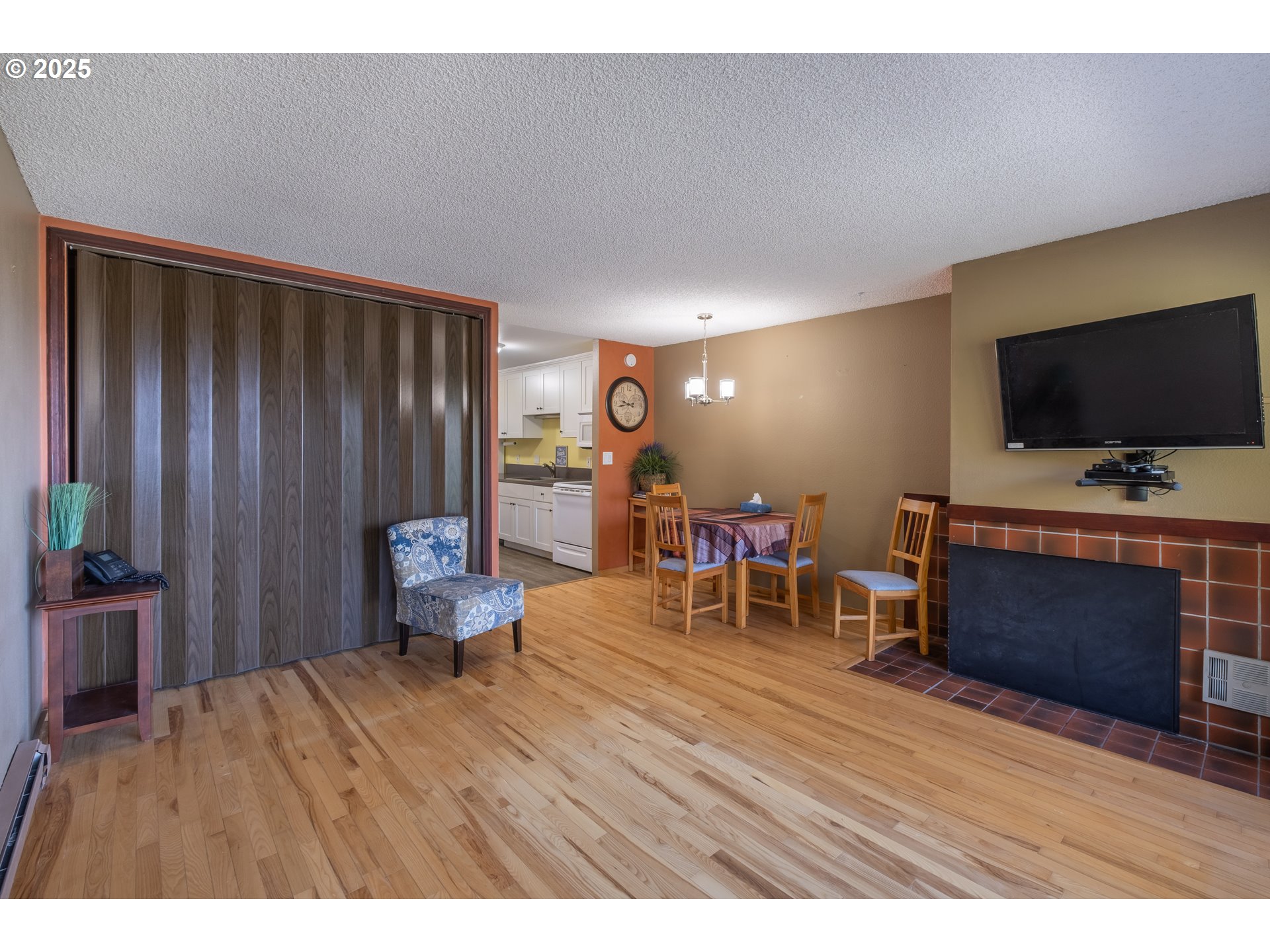 301 Otter Crest Loop, Unit 174/175 Otter Rock, OR 97369 - Photo 9 of 46 a living room with furniture and a flat screen tv
