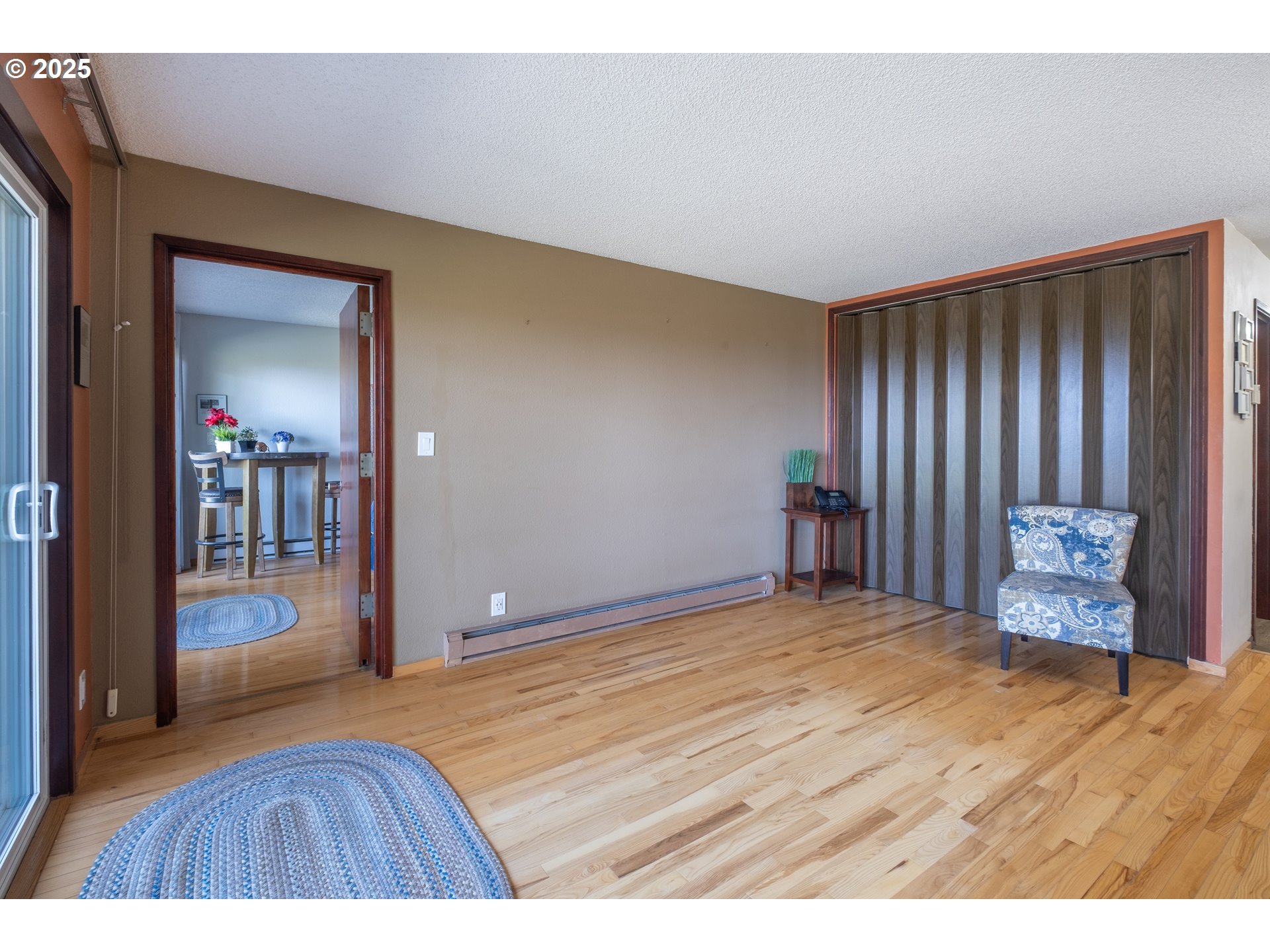301 Otter Crest Loop, Unit 174/175 Otter Rock, OR 97369 - Photo 10 of 46 a view of empty room with wooden floor