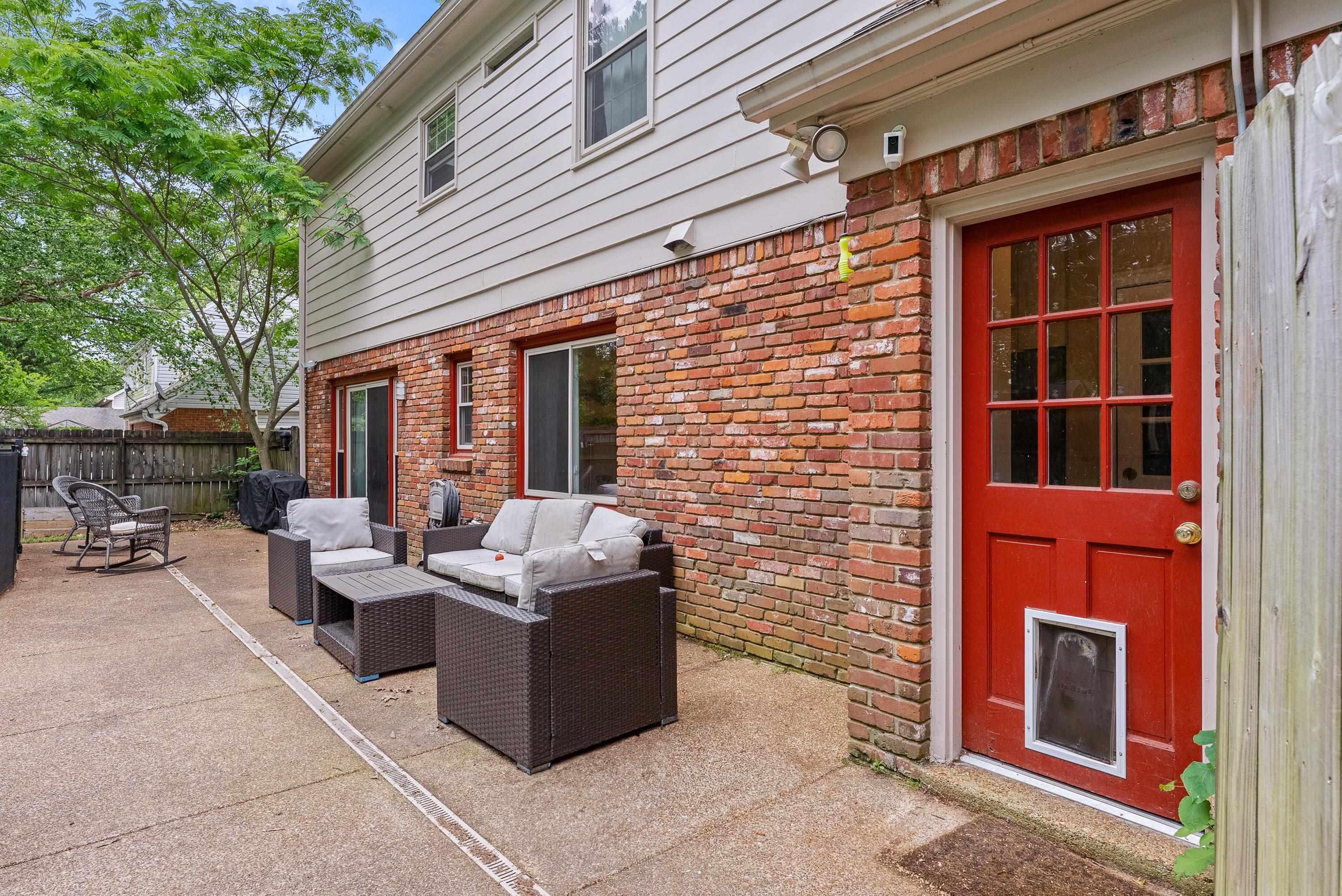 182 East Powell Road Collierville, TN 38017 - Photo 18 of 21 a patio with couches and a fire pit
