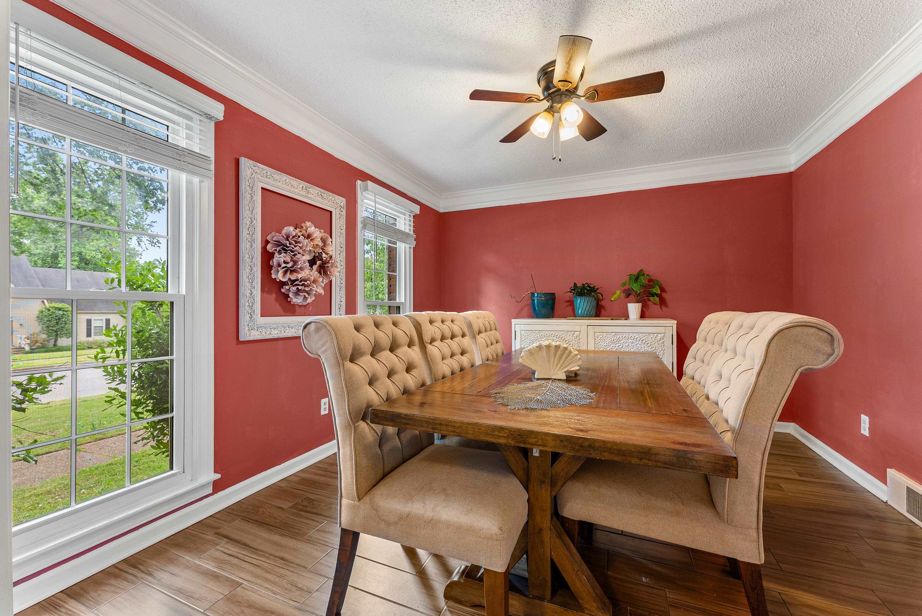 182 East Powell Road Collierville, TN 38017 - Photo 5 of 21 a view of a dining room with furniture window and wooden floor