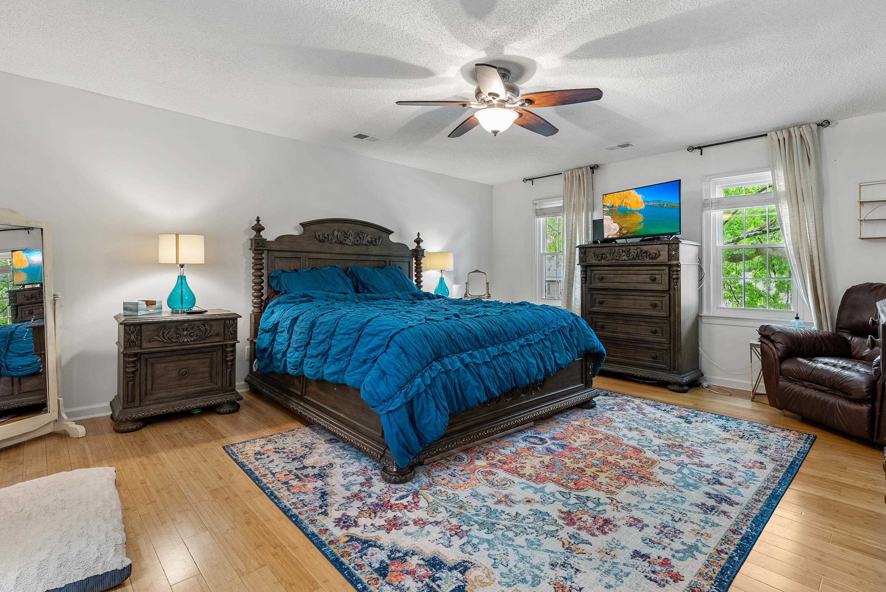 182 East Powell Road Collierville, TN 38017 - Photo 9 of 21 a bedroom with a bed dresser and a couch