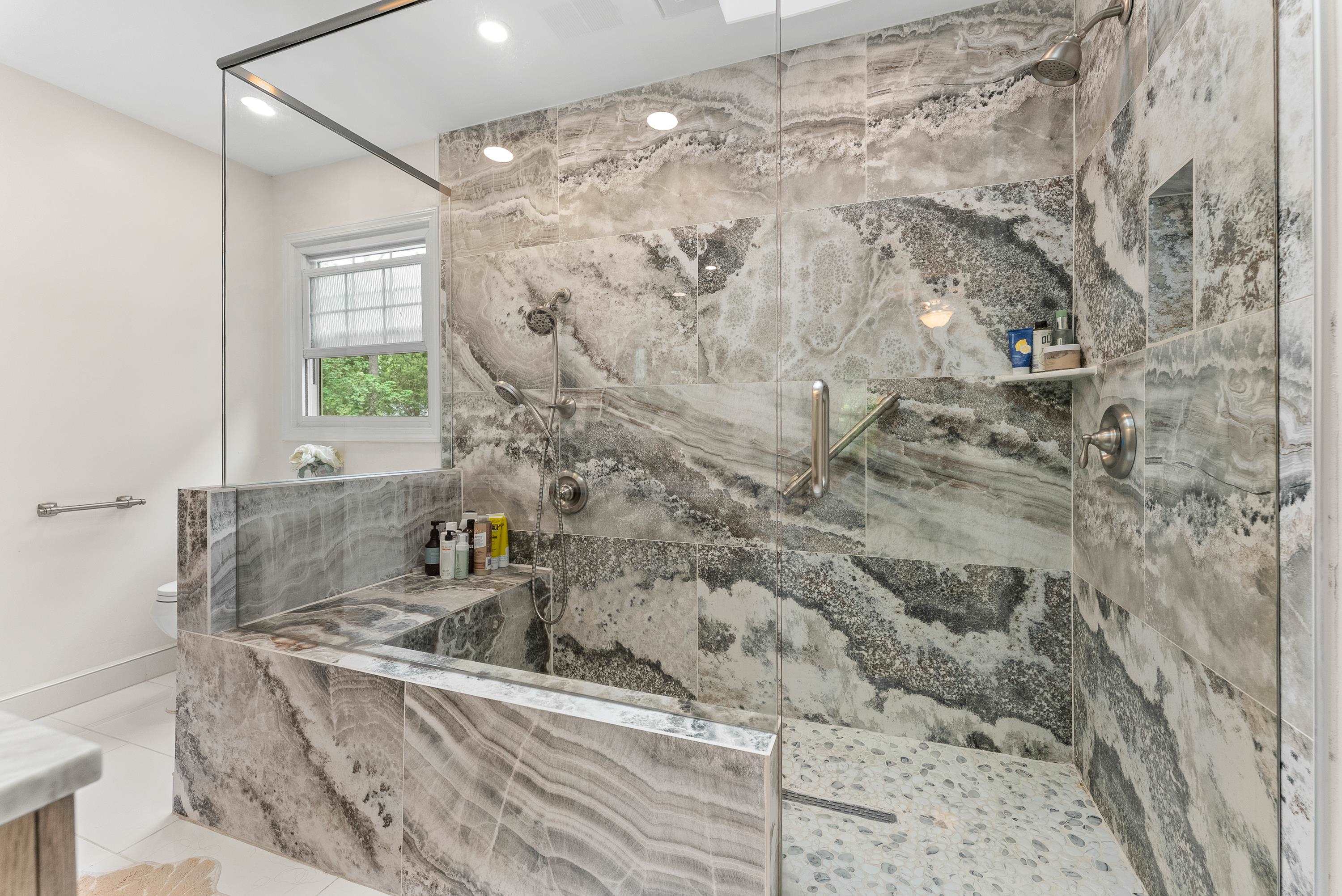 182 East Powell Road Collierville, TN 38017 - Photo 10 of 21 a bathroom with a bathtub and shower