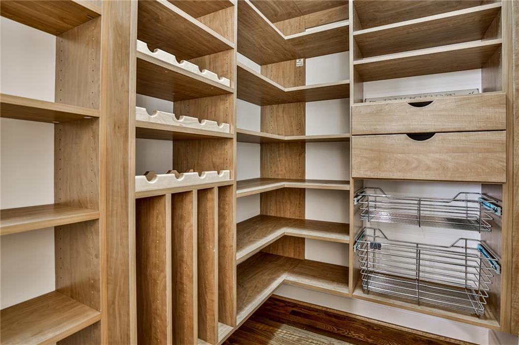 1621 Duncan Drive Northwest Atlanta, GA 30318 - Photo 12 of 53 a view of walk in closet with empty racks