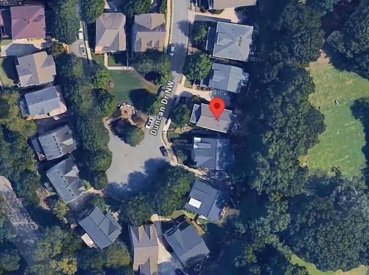 1621 Duncan Drive Northwest Atlanta, GA 30318 - Photo 15 of 53 an aerial view of houses with outdoor space