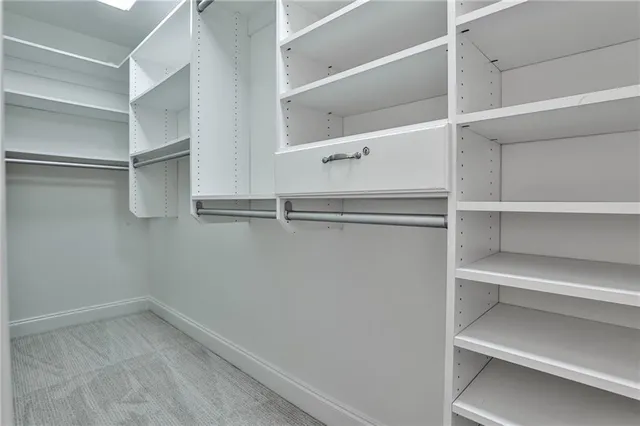 a view of an empty walk in closet