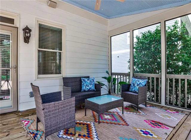 a outdoor living space with furniture and a potted plant