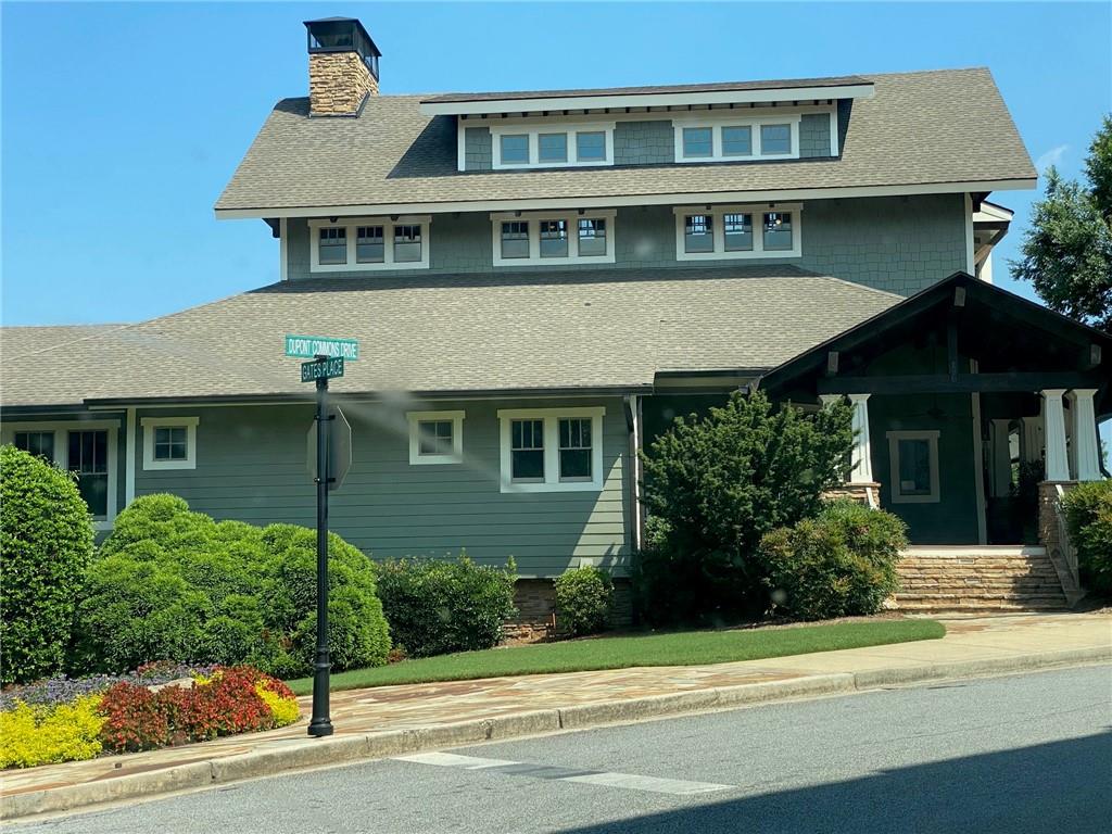 1621 Duncan Drive Northwest Atlanta, GA 30318 - Photo 35 of 53 a front view of a house with a garden