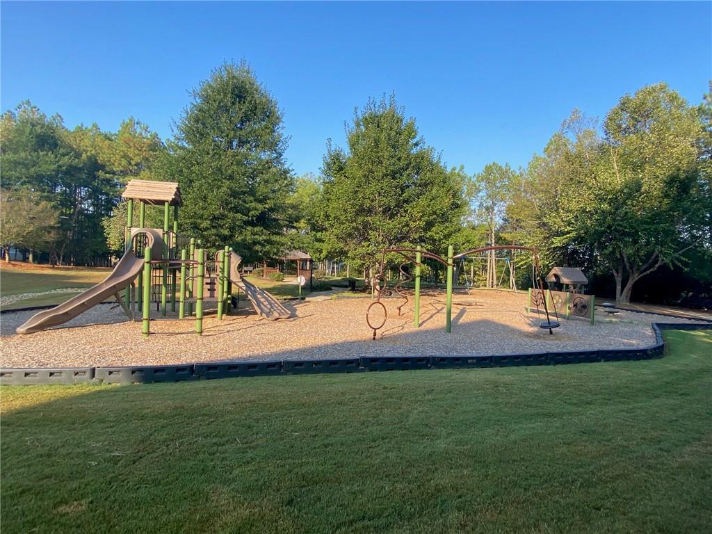 1621 Duncan Drive Northwest Atlanta, GA 30318 - Photo 44 of 53 a view of a house with a backyard