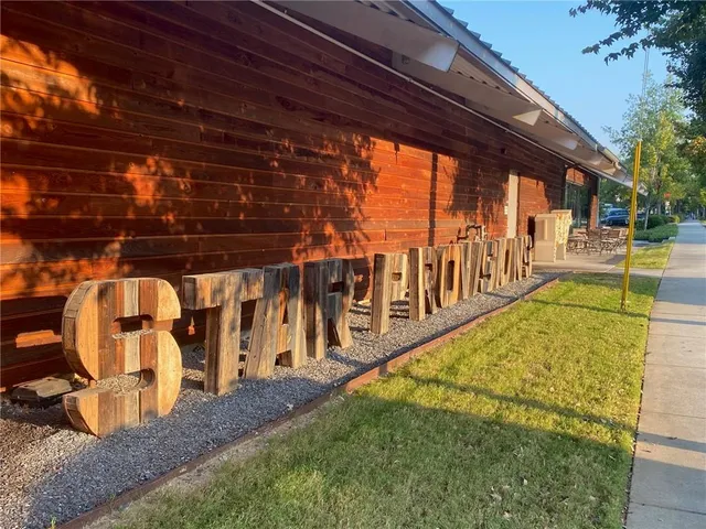 a view of a cafe with table and chairs