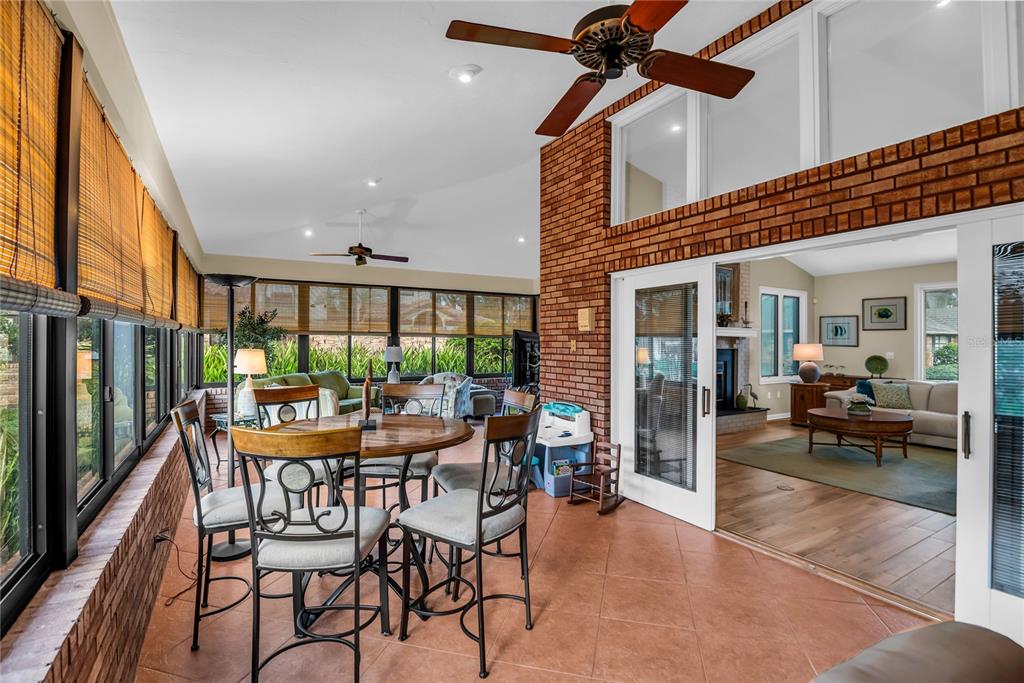 104 Acacia Point Yalaha, FL 34797 - Photo 15 of 83 a view of a dining room with furniture window and outside view