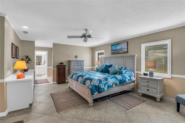 a bathroom with a double vanity sink mirror and shower