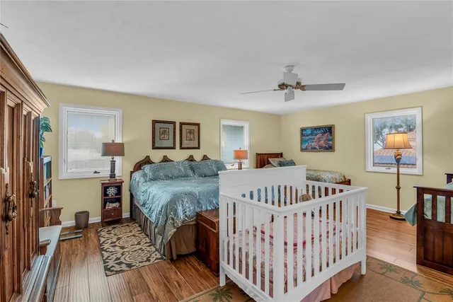 a bed room with a bed and a view of bedroom