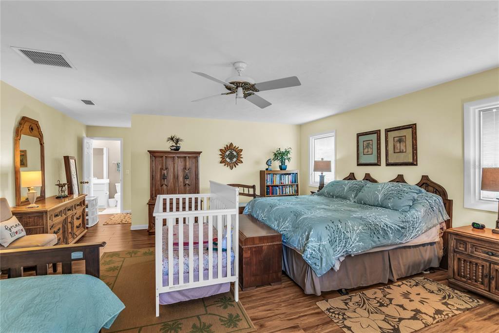 104 Acacia Point Yalaha, FL 34797 - Photo 32 of 83 a living room with furniture and a flat screen tv