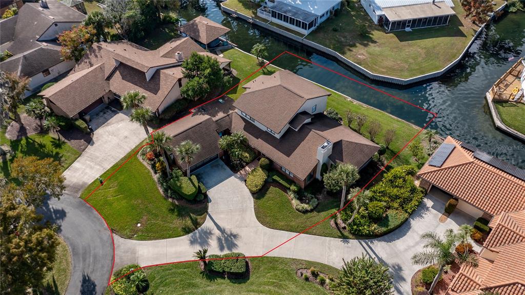 104 Acacia Point Yalaha, FL 34797 - Photo 75 of 83 an aerial view of house with yard swimming pool and outdoor seating