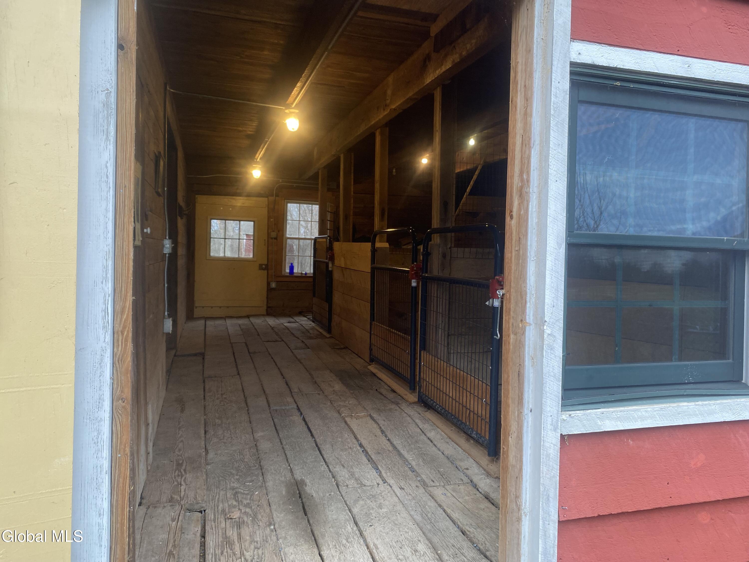 797 Western Road Schodack, NY 12033 - Photo 55 of 57 Paddock_looking into stalls