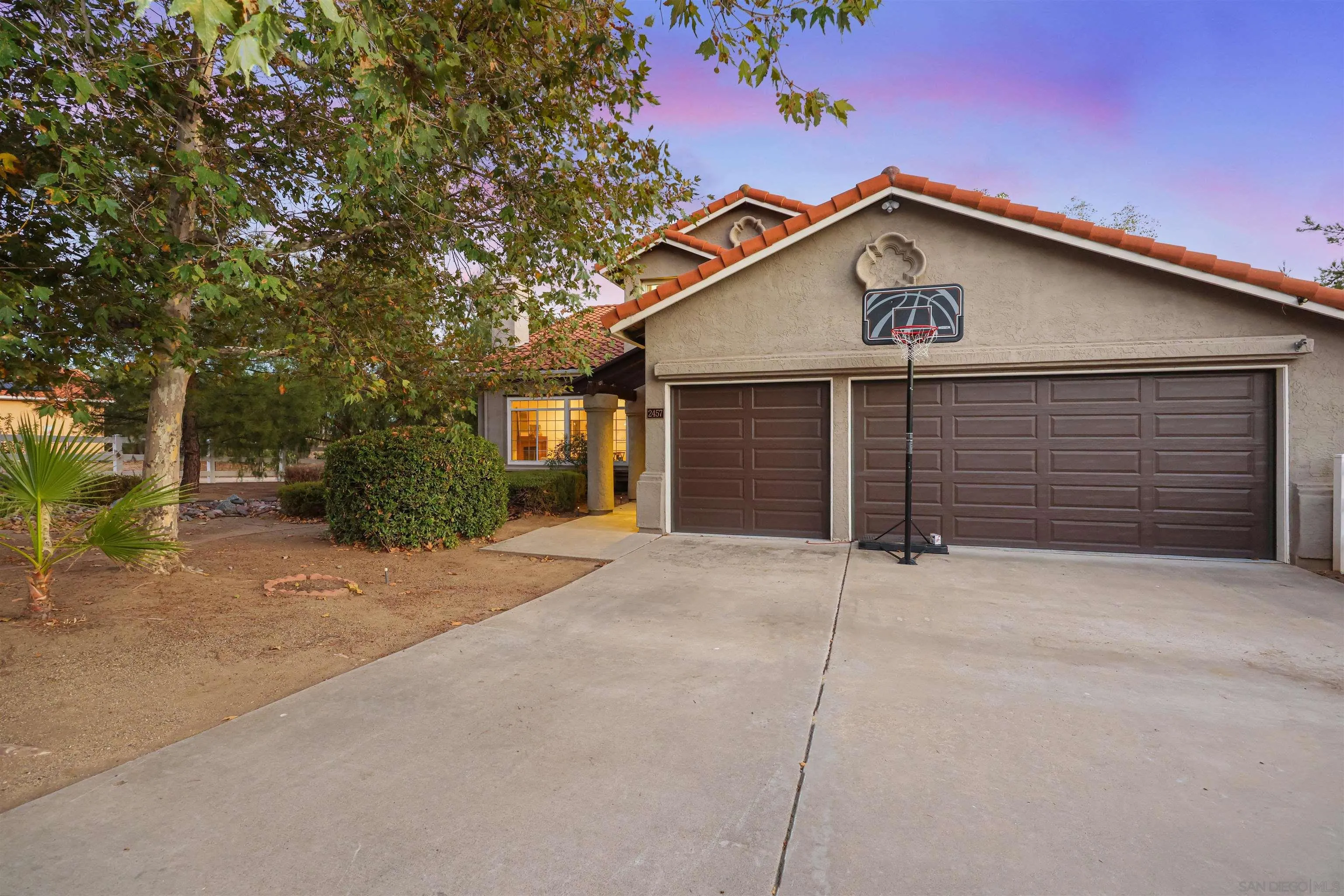 2457 Victoria Circle Alpine, CA 91901 - Photo 1 of 40 a view of the house with a yard and garage