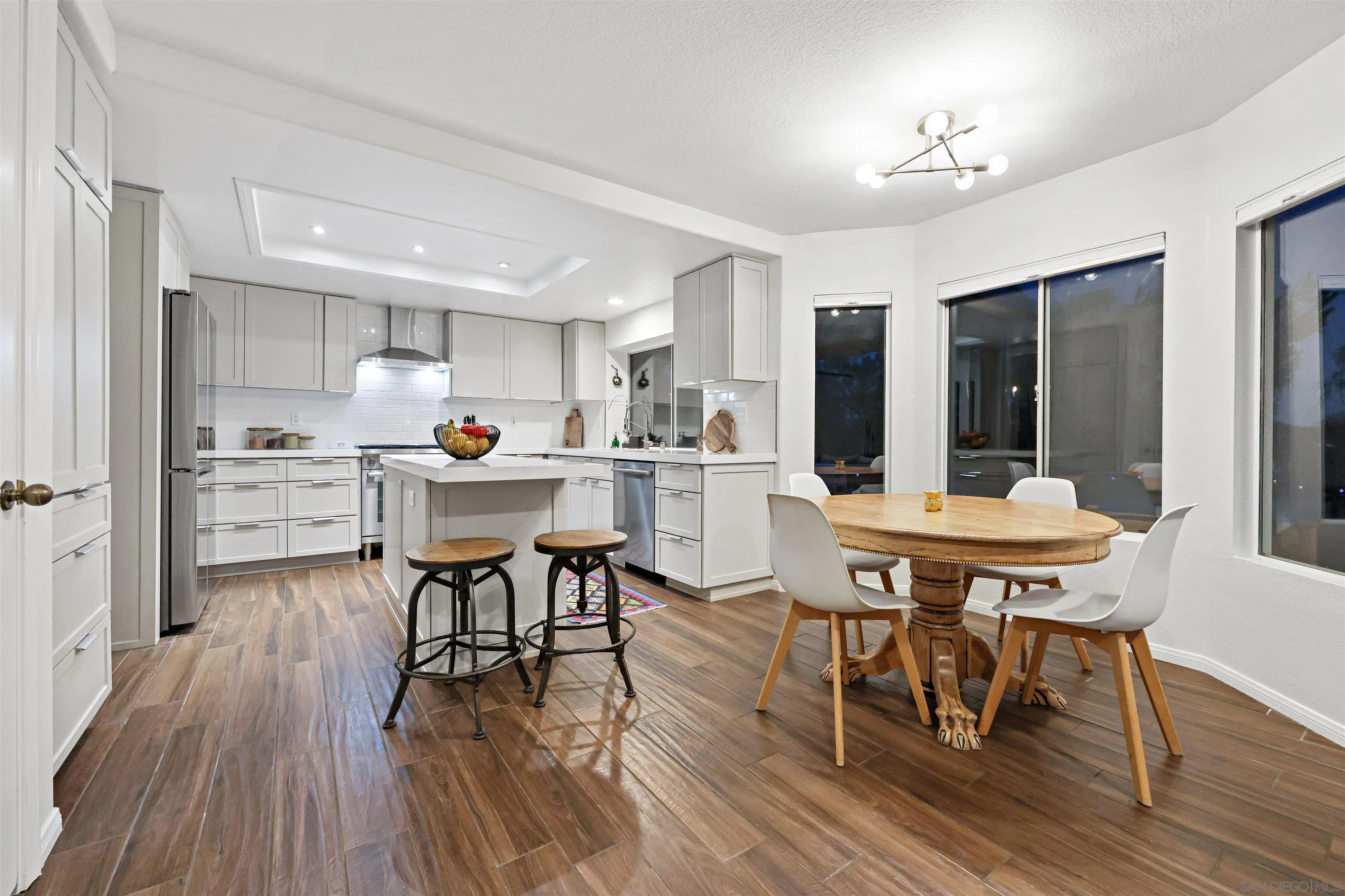 2457 Victoria Circle Alpine, CA 91901 - Photo 13 of 40 a view of a dining room with furniture and wooden floor