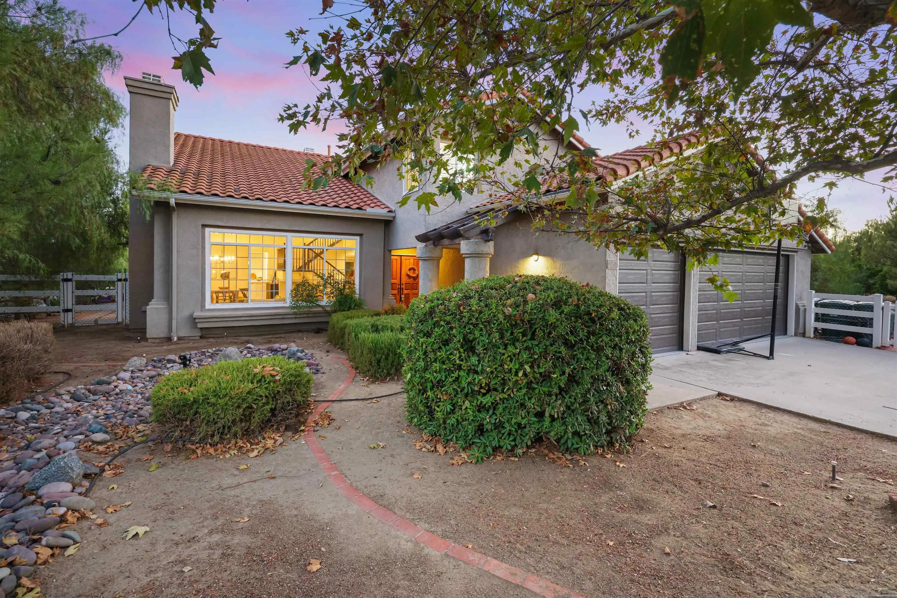 2457 Victoria Circle Alpine, CA 91901 - Photo 2 of 40 a front view of a house with garden