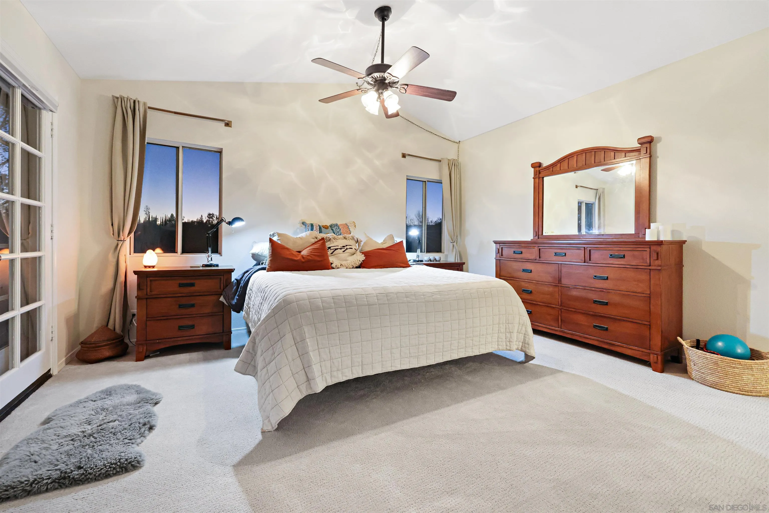 2457 Victoria Circle Alpine, CA 91901 - Photo 22 of 40 a bedroom with a bed and a dresser