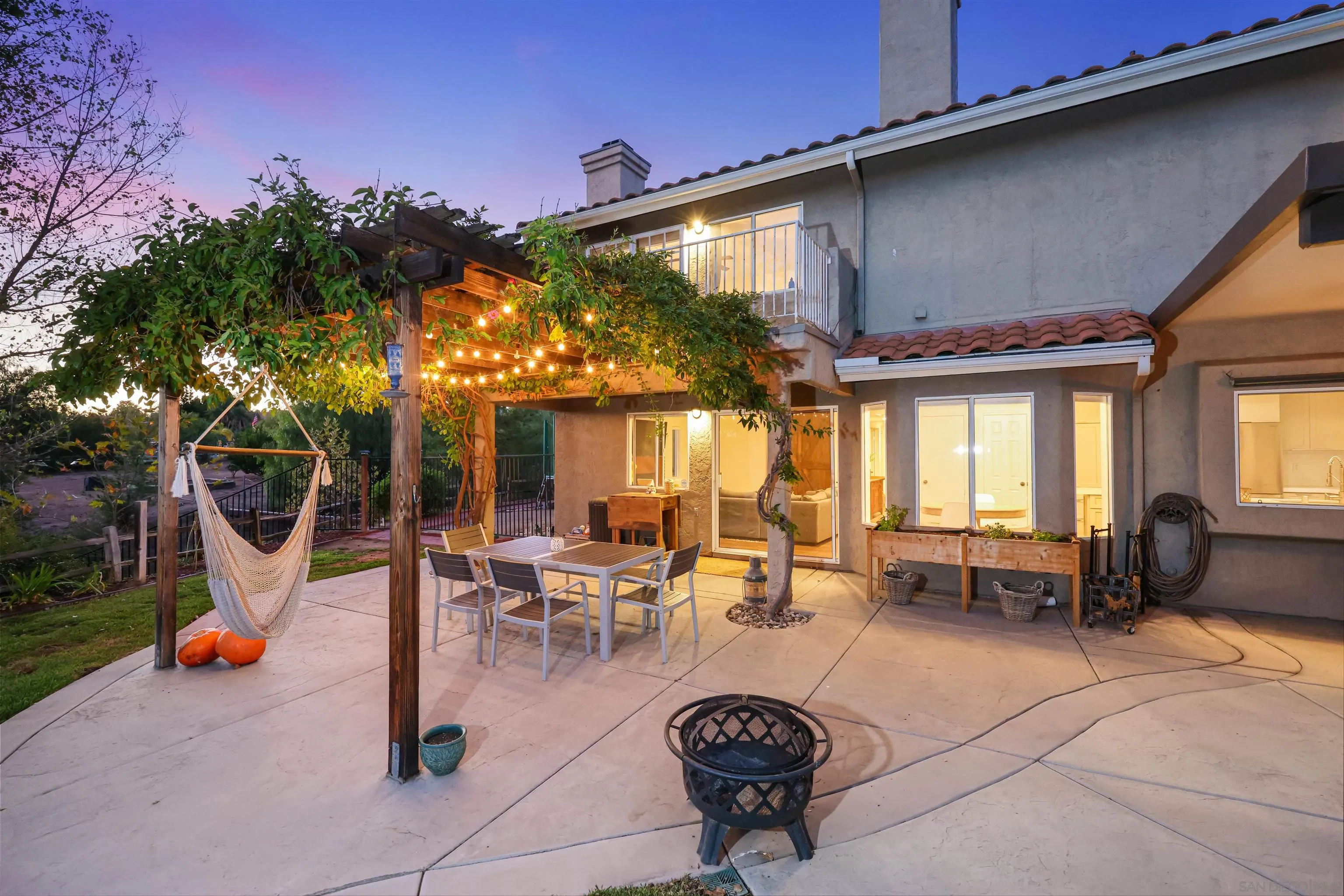 2457 Victoria Circle Alpine, CA 91901 - Photo 29 of 40 a outdoor space with lots of furniture and glass windows