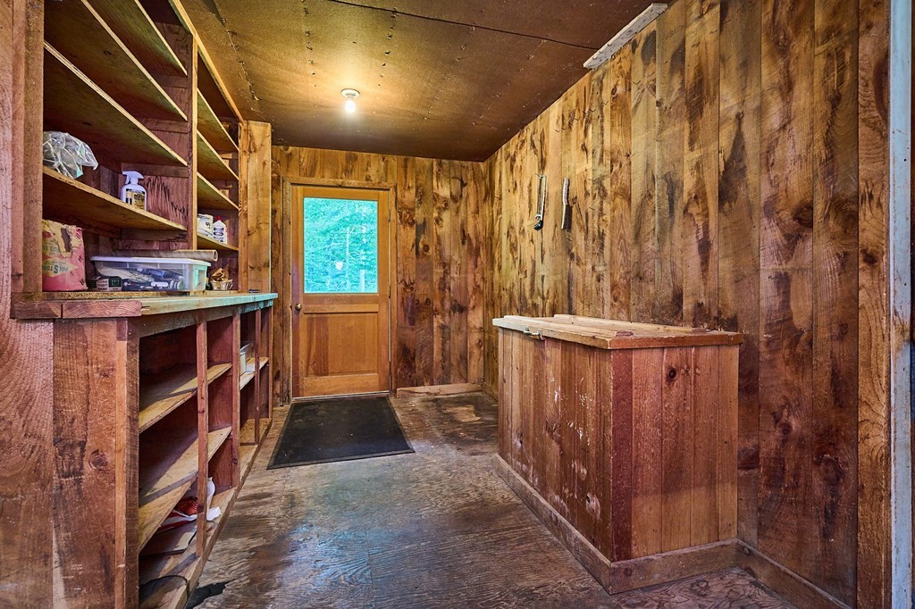 91 Radiker Road Worthington, MA 01098 - Photo 3 of 30 a view of walk in closet with clothes and shoes