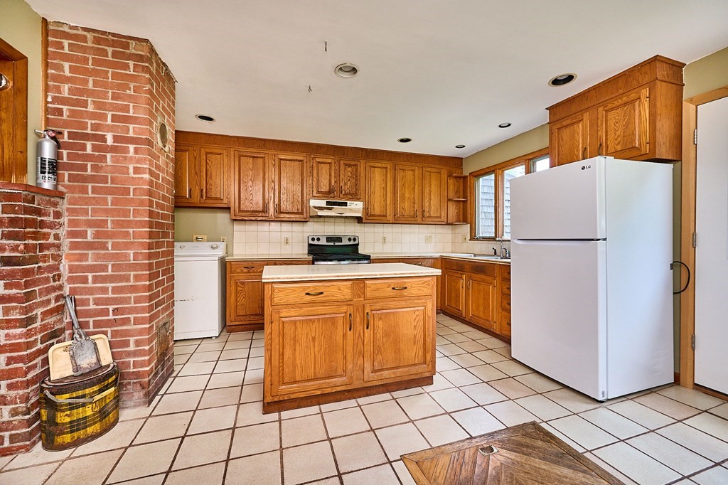 91 Radiker Road Worthington, MA 01098 - Photo 5 of 30 a kitchen with stainless steel appliances granite countertop a refrigerator sink and stove