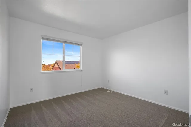 an empty room with window