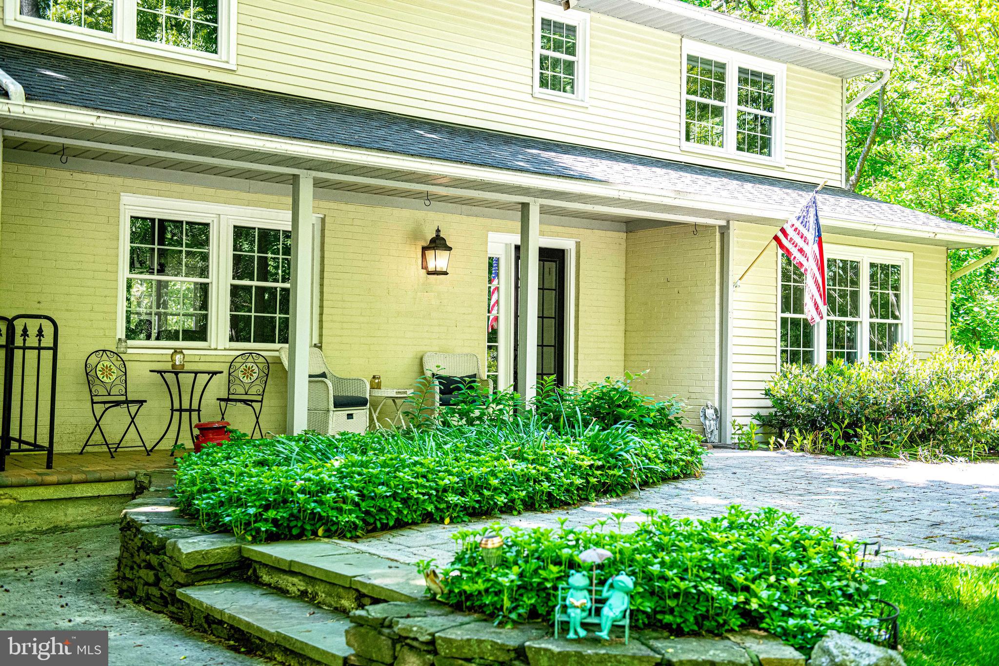 17200 Wesley Chapel Road Monkton, MD 21111 - Photo 4 of 51 Large walkways with stone garden beds