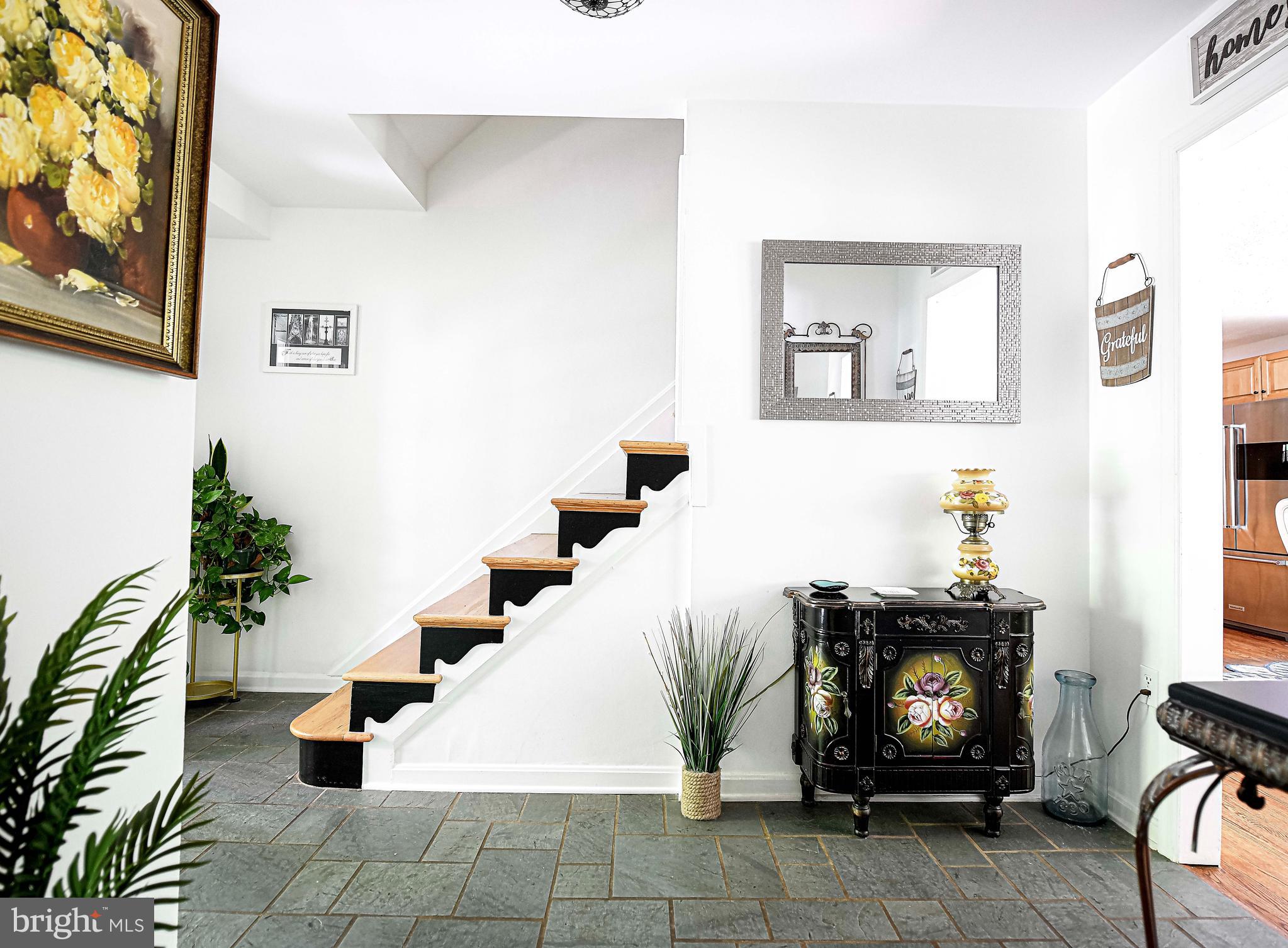 17200 Wesley Chapel Road Monkton, MD 21111 - Photo 9 of 51 Stairs to left with center hall flow