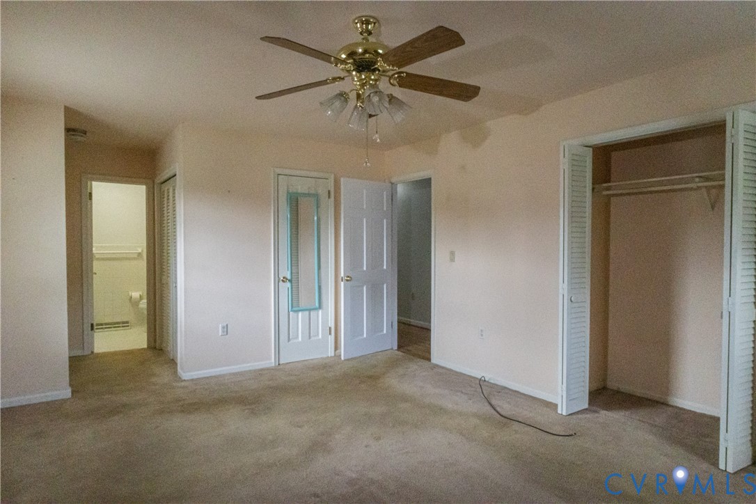 309 Old Plank Road Kenbridge, VA 23944 - Photo 27 of 45 Ceiling fan with light fixture, carpeted flooring,