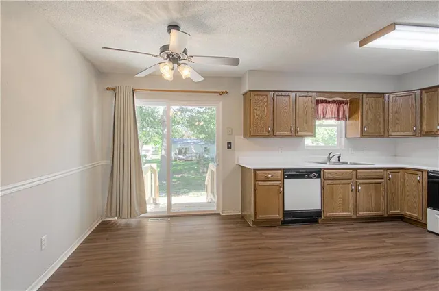 $270,000 | 404 Northeast Castle Drive, Lee's Summit, MO 64086