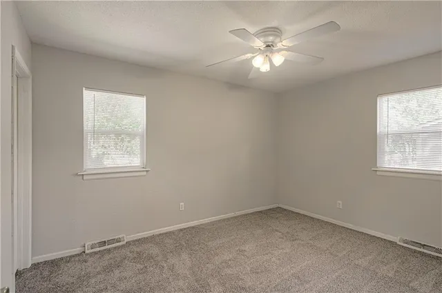 $270,000 | 404 Northeast Castle Drive, Lee's Summit, MO 64086