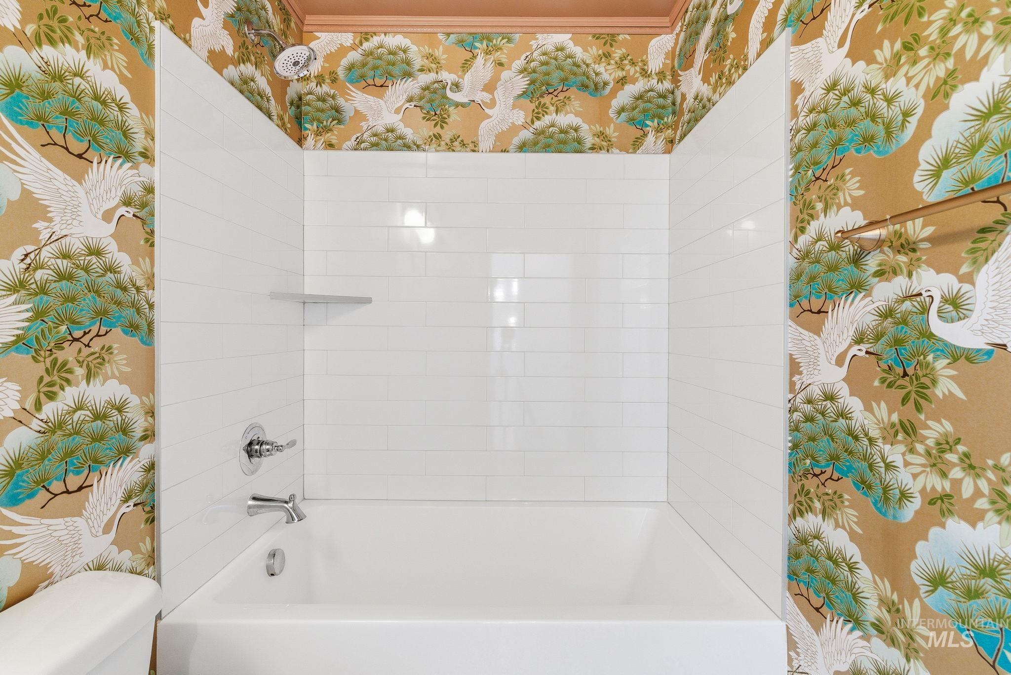 110 Homesteaders Street Middleton, ID 83644 - Photo 36 of 49 Bathroom featuring wallpapered walls and shower / washtub combination