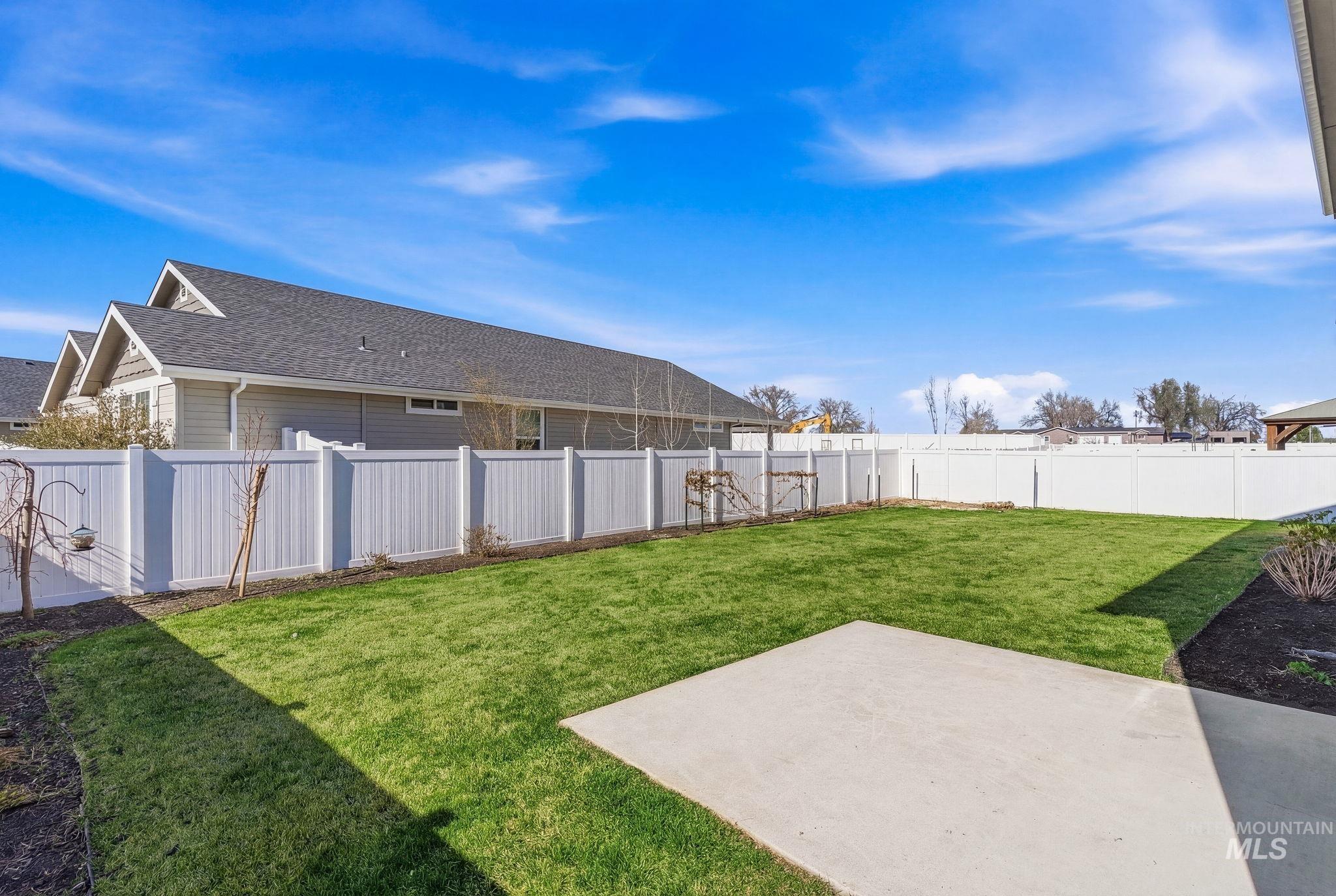 110 Homesteaders Street Middleton, ID 83644 - Photo 47 of 49 Fenced backyard with a patio