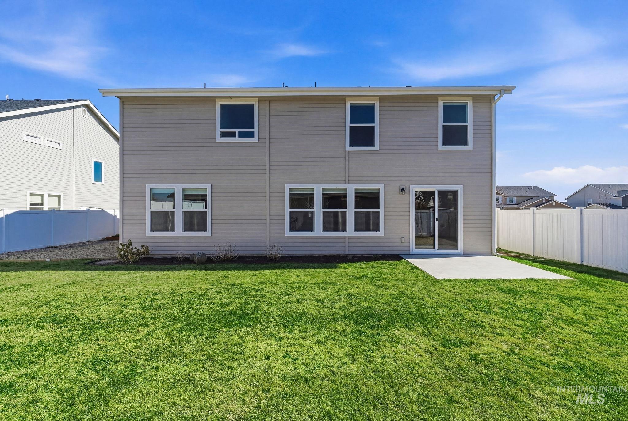 110 Homesteaders Street Middleton, ID 83644 - Photo 49 of 49 Rear view of house featuring a patio area and a fenced backyard