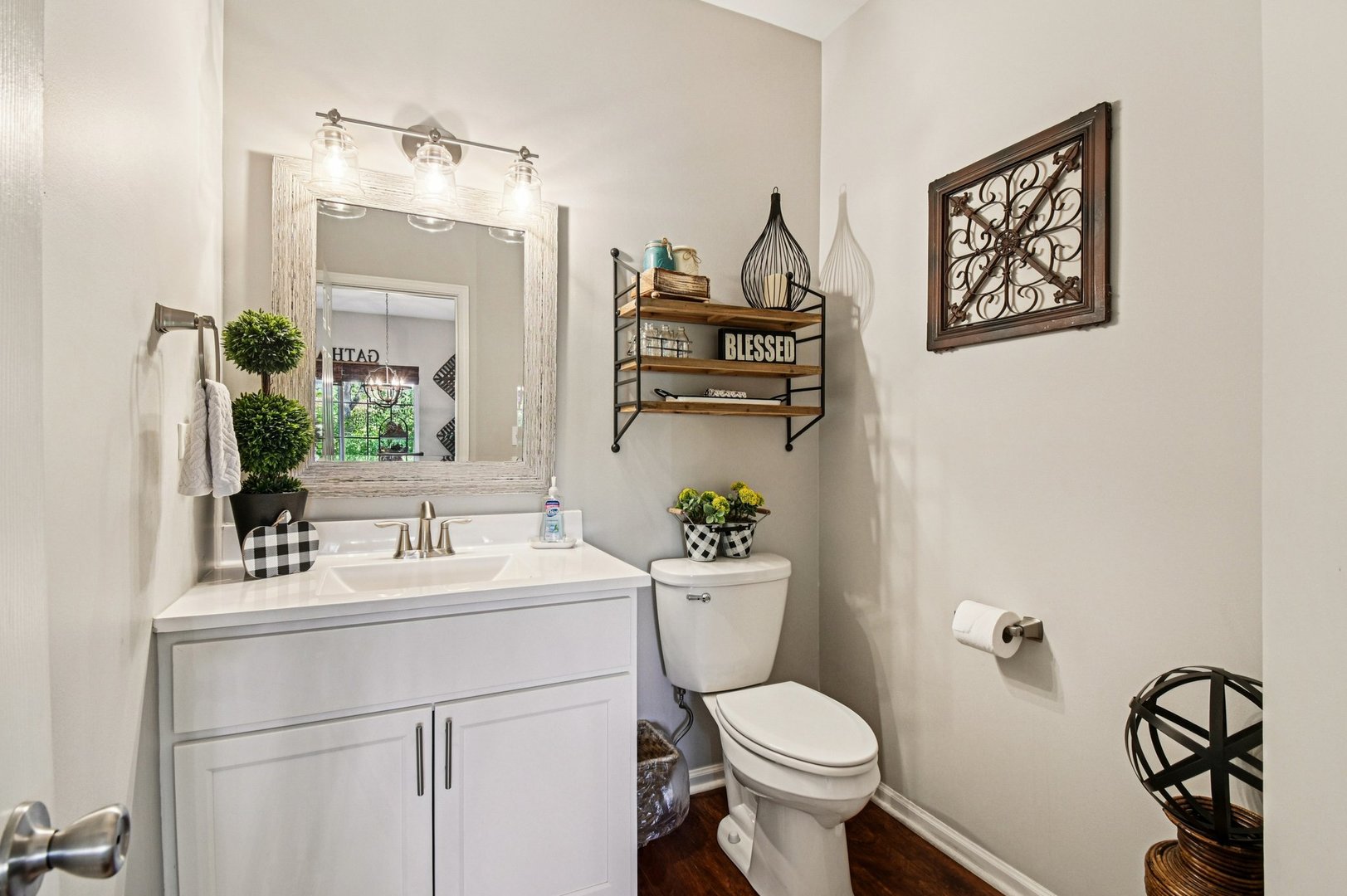 2223 Rockefeller Drive Geneva, IL 60134 - Photo 12 of 30 a bathroom with a toilet sink and mirror