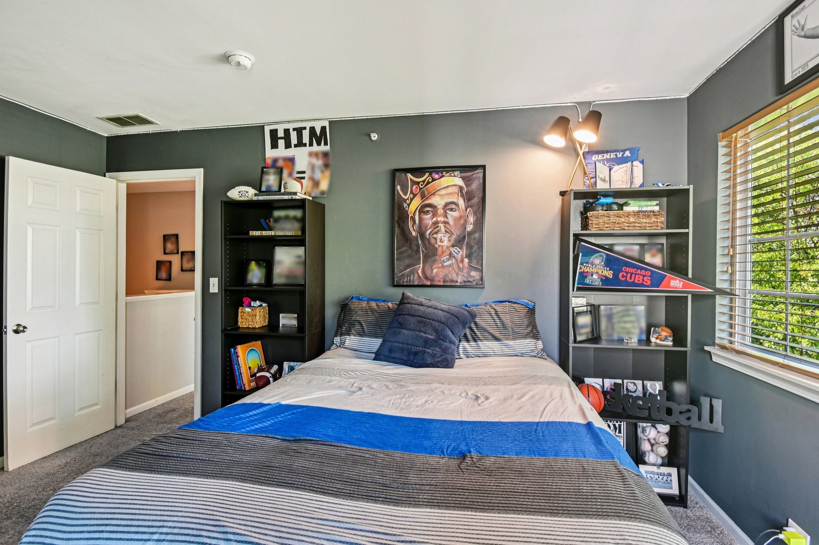 2223 Rockefeller Drive Geneva, IL 60134 - Photo 20 of 30 a bedroom with a bed and a book shelf