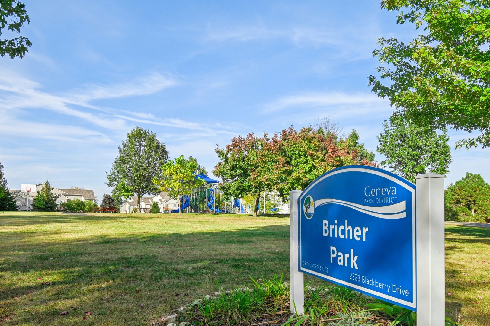 2223 Rockefeller Drive Geneva, IL 60134 - Photo 25 of 30 a view of a sign board with a big yard