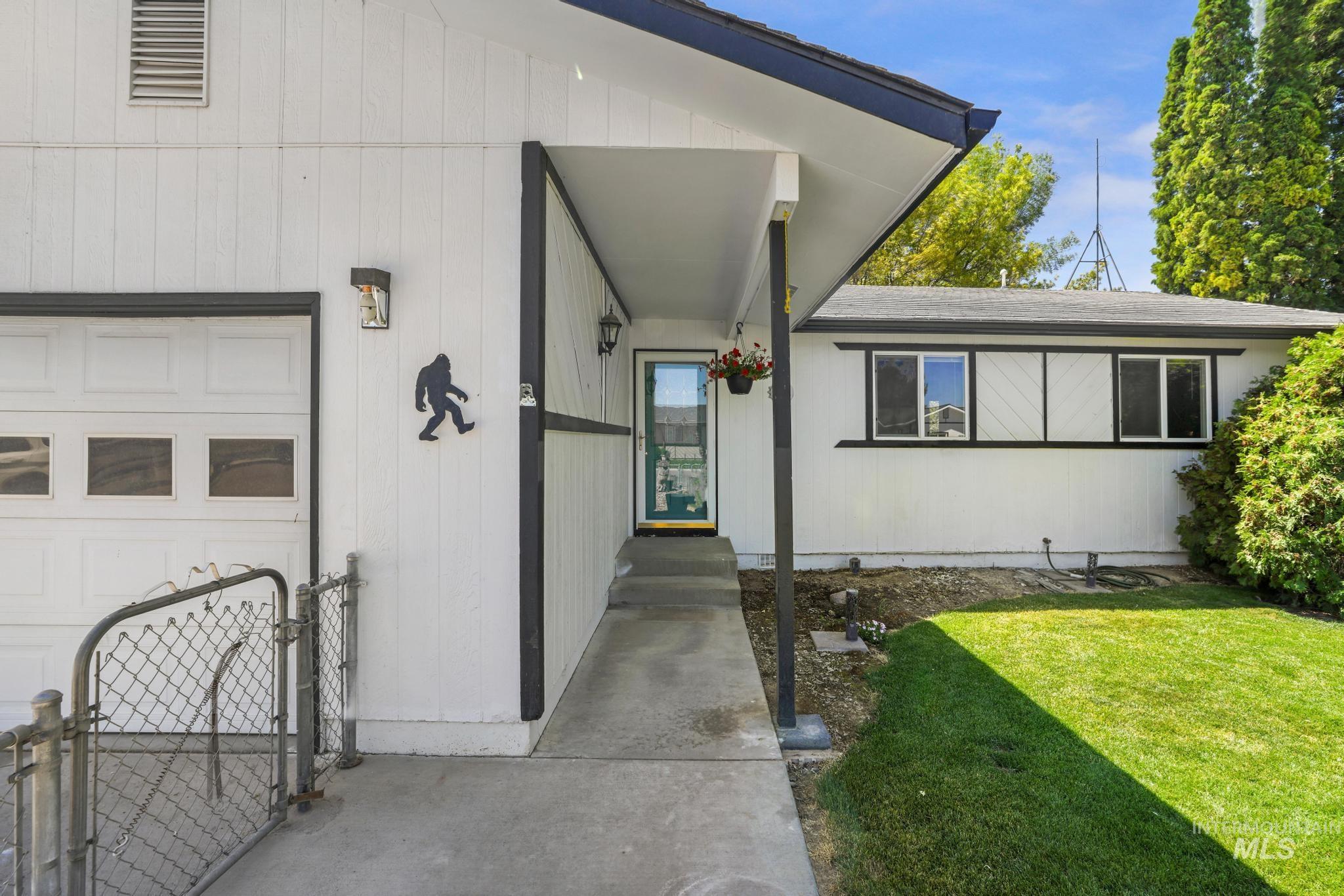 712 Locust Street Kimberly, ID 83341 - Photo 26 of 26 Single-story residence featuring a white exterior with black trim and a dark-shingle roof